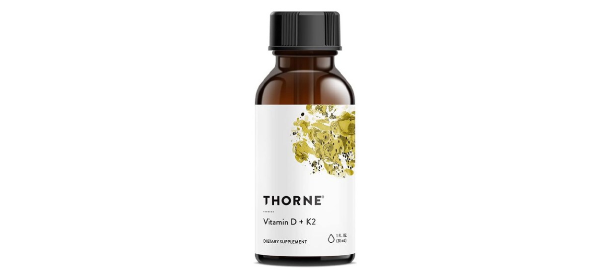 Bottle of Thorne Vitamin D and K2 Liquid on white background